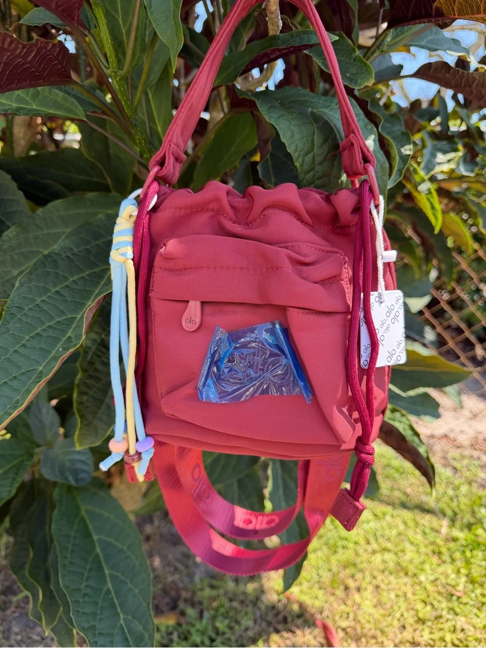 ALO Yoga Burgundy  Drawstring Mini Bucket Bag with Multicolor Cord Tassels